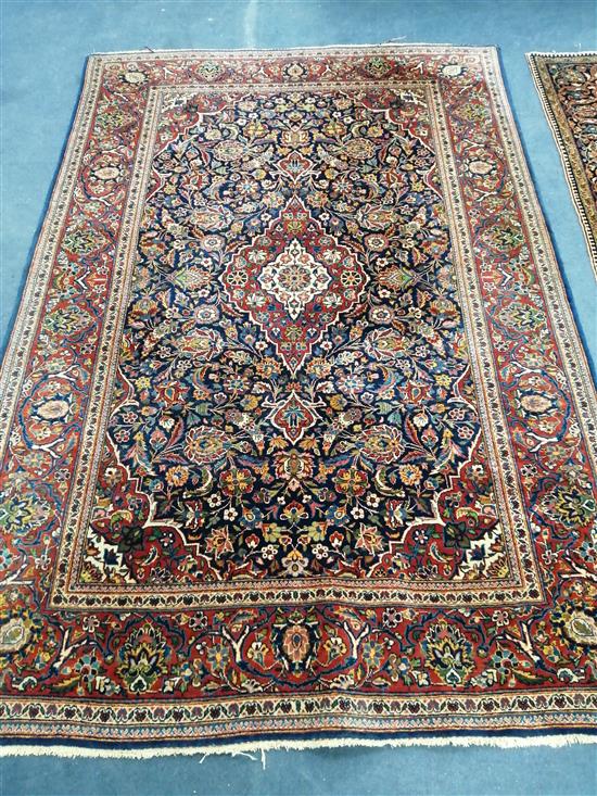 A Persian blue ground rug 200 x 132cm